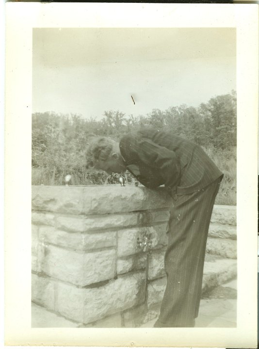 1252.jpg - Marlin Wyse getting a drink.  1942c