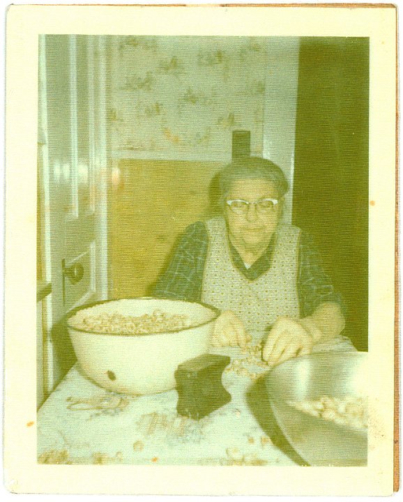 1273.jpg - Eva Boese picking nuts.  1965c  scanned from a photocopy.
