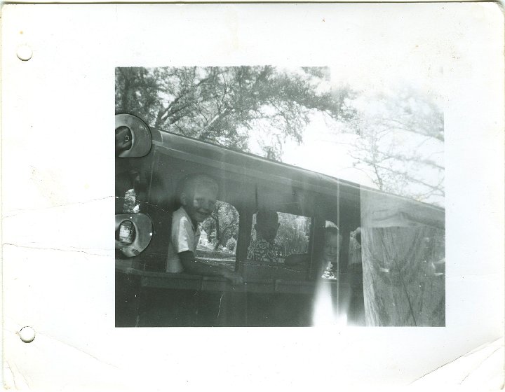 1300.jpg - Unknown youth in next car.  1956c